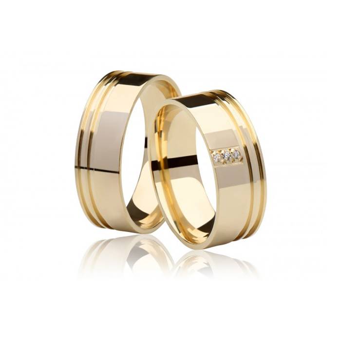 Alianças em ouro 18k 15g 7mm com frisos e pedra